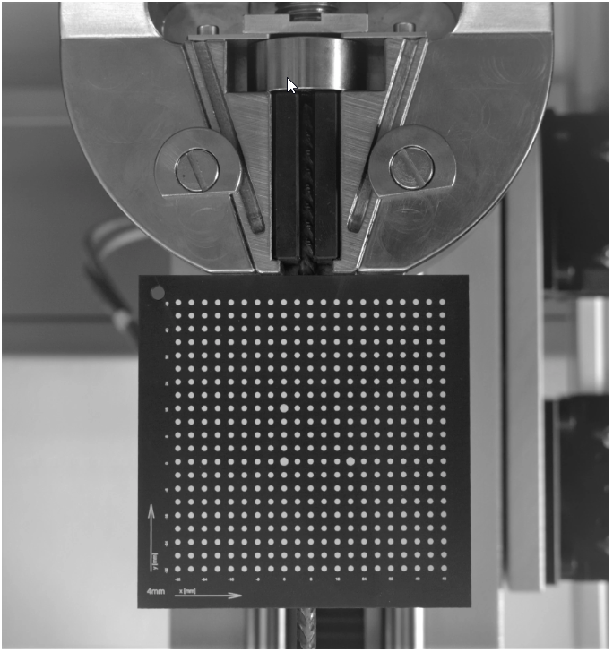 DIC video strain gauge calibration plate